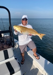 Terry A. Bollom with a redfish